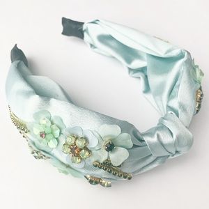 Light blue headband with embellishments
